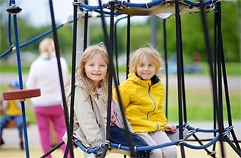 two-children-having-fun-on-playground-spring-summ-2022-08-01-03-20-35-utc-copy-1.jpg